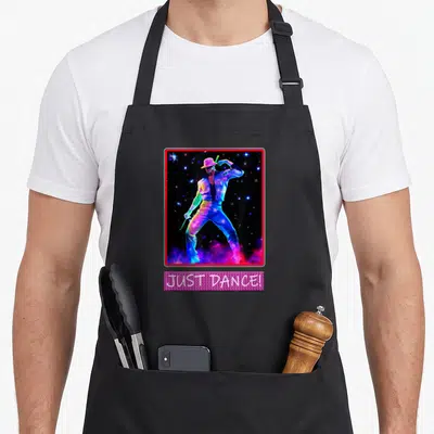 Tablier de cuisine noir avec illustration d'un danseur multicolore et texte Just Dance en bas.