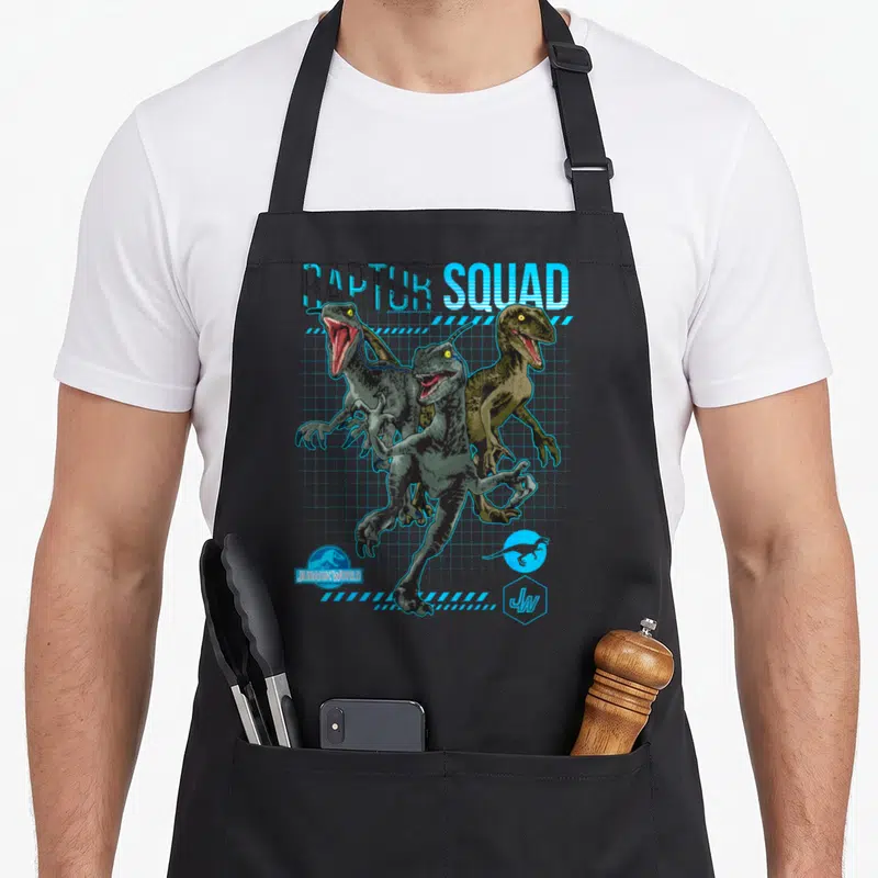 Tablier de cuisine noir avec illustration de trois raptors et le texte Raptor Squad Jurassic World