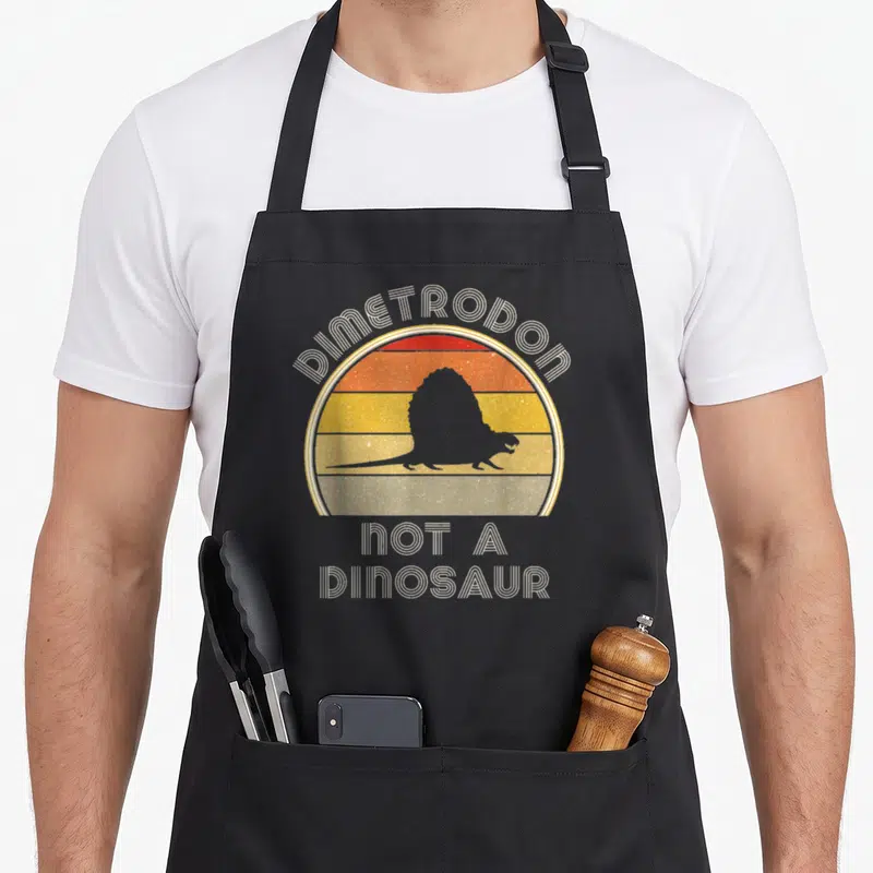 Tablier de cuisine noir avec silhouette Dimetrodon et texte Not a dinosaur style rétro
