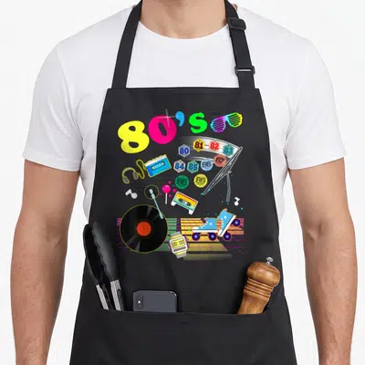 Tablier de cuisine noir avec illustrations colorées 80s cassette patins vinyl et lunettes rétro