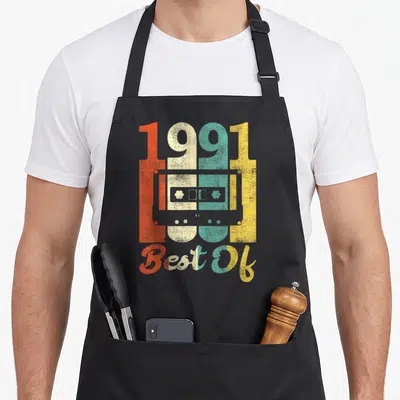 Tablier de cuisine noir avec illustration cassette 1991 Best Of couleurs délavées vintage années 90