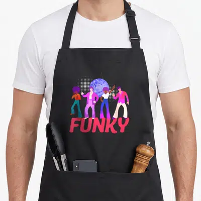 Tablier de cuisine noir avec quatre personnages dansant sous une balle disco et le mot Funky en rose.