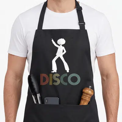 Tablier de cuisine noir avec silhouette blanche dansante et le mot DISCO en couleurs arc-en-ciel stylisées années 70.