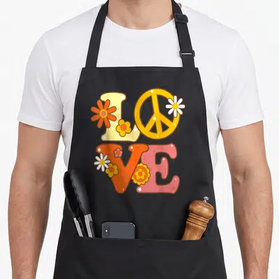 Tablier de cuisine noir avec illustration Love, signe de paix et fleurs colorées style années 60