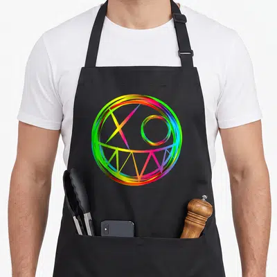 Tablier de cuisine noir avec un visage rave coloré en lignes lumineuses multicolores formant une expression joyeuse.