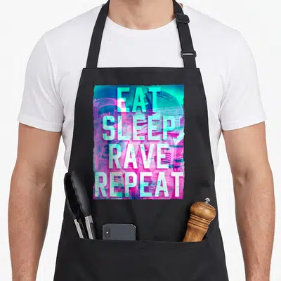 Tablier de cuisine noir avec le texte Eat Sleep Rave Repeat en lettres turquoise sur un fond abstrait rose et bleu électrique.