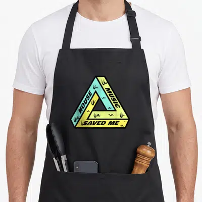Tablier de cuisine noir avec un triangle de Penrose jaune et turquoise portant l'inscription HOUSE MUSIC SAVED ME.