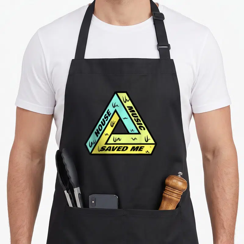 Tablier de cuisine noir avec un triangle de Penrose jaune et turquoise portant l'inscription HOUSE MUSIC SAVED ME.