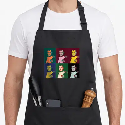 Tablier de cuisine noir avec six portraits colorés de Napoléon Bonaparte en style pop art.