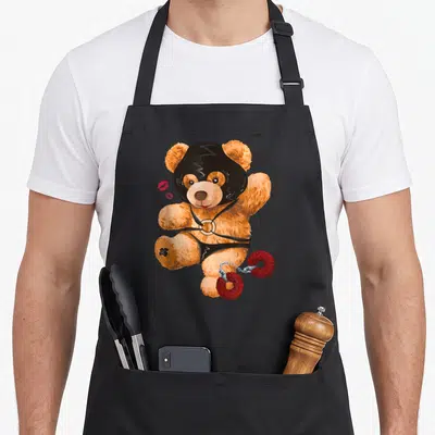 Tablier de cuisine noir avec ours en peluche masqué harnais et fers à donuts rouges