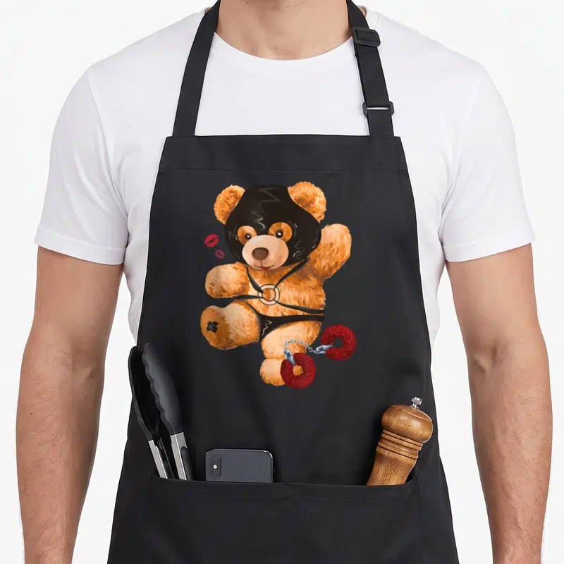 Tablier de cuisine noir avec ours en peluche masqué harnais et fers à donuts rouges