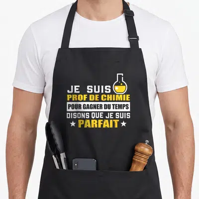 Tablier de cuisine noir avec inscription Je suis prof de chimie et illustration fiole jaune.