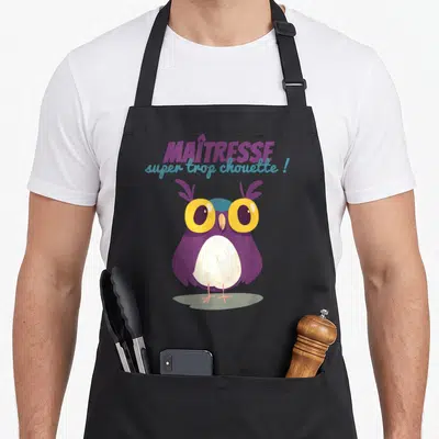Tablier de cuisine noir avec hibou violet et texte Maîtresse super trop chouette.