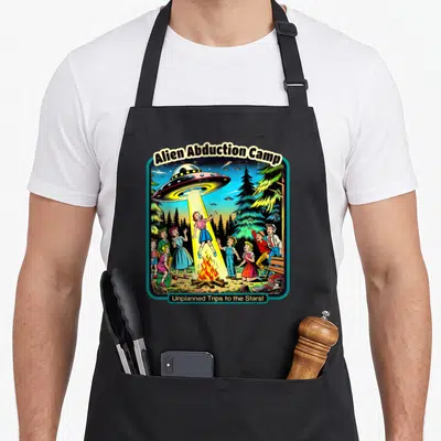 Tablier de cuisine noir avec illustration colorée d'un enlèvement alien au camp vintage.