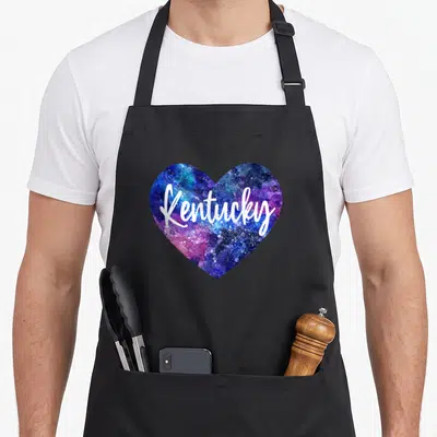 Tablier de cuisine noir avec un grand cœur aux couleurs de la galaxie et le texte J'aime le Kentucky USA Space Galaxy.