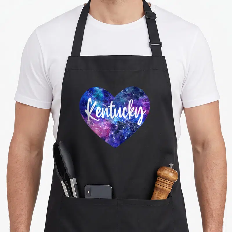 Tablier de cuisine noir avec un grand cœur aux couleurs de la galaxie et le texte J'aime le Kentucky USA Space Galaxy.
