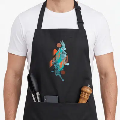 Tablier de cuisine noir avec illustration de Bugs Bunny et Lola Balling jouant au basketball sous le titre Space Jam