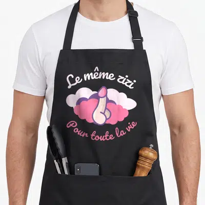 Tablier de cuisine noir avec illustration rose et violet et texte Le même zizi Pour toute la vie.