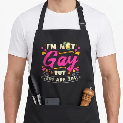 Tablier de cuisine noir avec le texte coloré Je ne suis pas gay mais 20$ et un cocktail au lime.