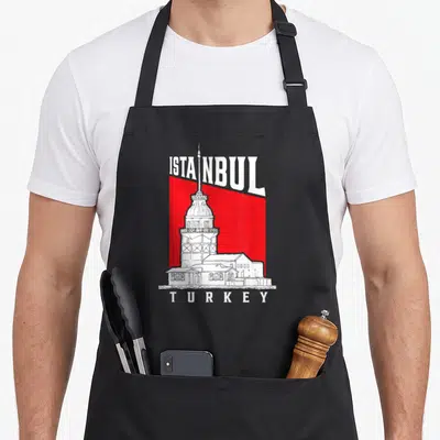 Tablier de cuisine noir avec illustration blanche de la Tour de Jeune Fille sur fond rouge et texte Istanbul Turkey.