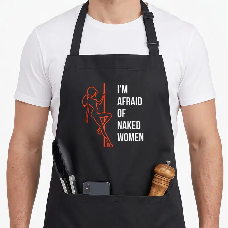 Tablier de cuisine noir avec silhouette femme en rouge et texte blanc I'm Afraid of Naked Women