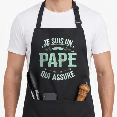 Tablier de cuisine noir avec inscription Je suis un Papé qui Assure et moustache mint vert.