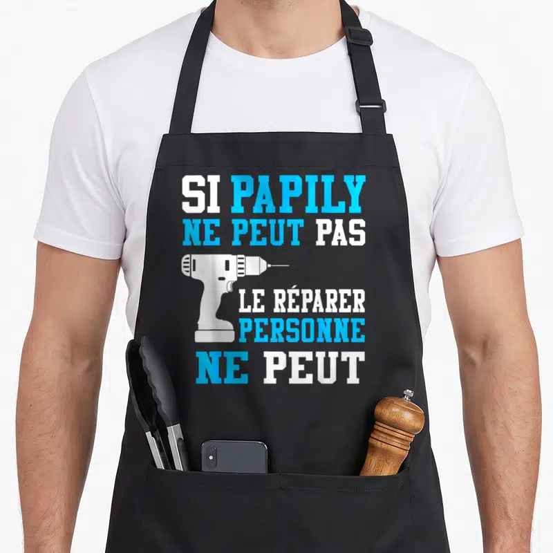 Tablier de cuisine noir avec texte blanc et bleu Si Papily ne peut pas le réparer personne ne peut et une perceuse.