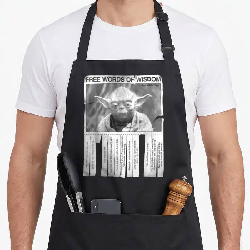 Tablier de cuisine noir avec motif flyer Free Words of Wisdom représentant Yoda Jedi Master et ses citations en anglais.
