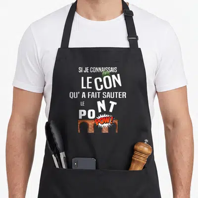 Tablier de cuisine noir avec l'inscription Si je connaissais le con qu'a fait sauter le pont au-dessus d'un pont en brique.