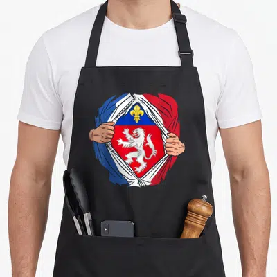 Tablier de cuisine noir avec illustration super-héros lyonnais drapeau et lion blanc