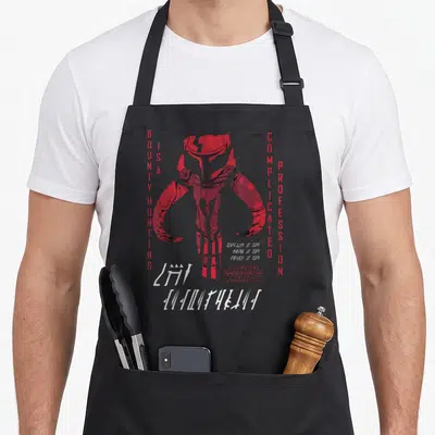 Tablier de cuisine noir avec illustration rouge du mythosaur et texte Complicated Profession en typographie stylisée.