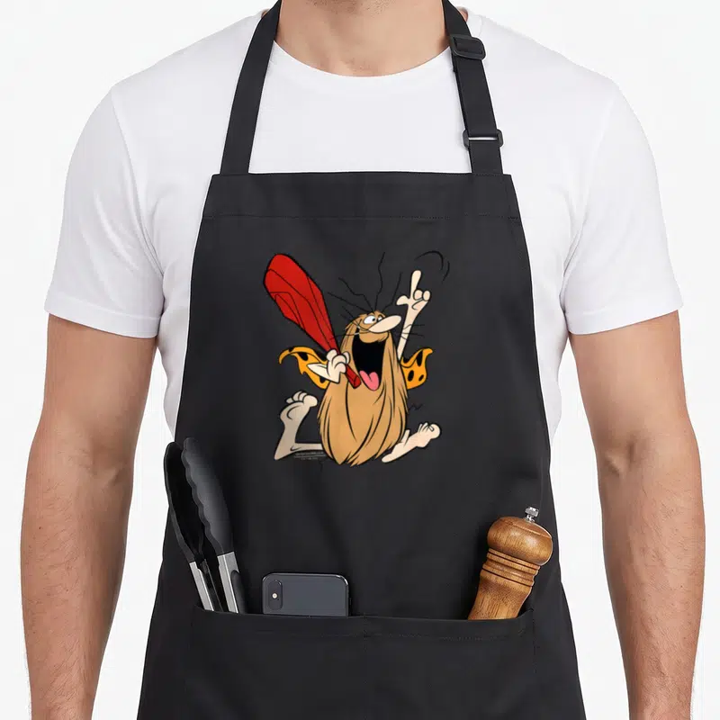 Tablier de cuisine noir avec Captain Caveman tenant une massue rouge et criant Unga Bunga en couleur vive.