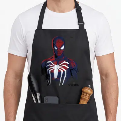 Tablier de cuisine noir avec portrait grunge de Spider-Man et logo araignée blanc en bas à droite