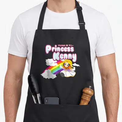 Tablier de cuisine noir avec une illustration colorée d'une princesse aux grands yeux et un arc-en-ciel.