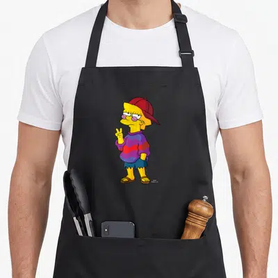 Tablier de cuisine noir avec Lisa Simpson en tenue Cool Kid portant une casquette rouge et un pull multicolore.