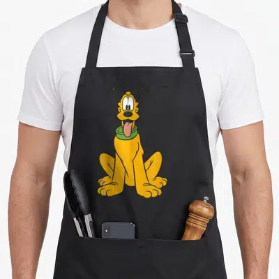 Tablier de cuisine noir avec illustration colorée de Pluto assis la langue sortie