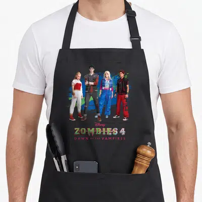 Tablier de cuisine noir avec Nova Victor Zed Addison et logo Zombies 4 Dawn of the Vampires imprimé au centre.
