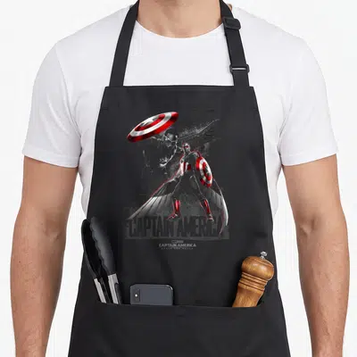Tablier de cuisine noir avec Captain America Sam Wilson aux ailes et bouclier rouge blanc en illustration graphique.