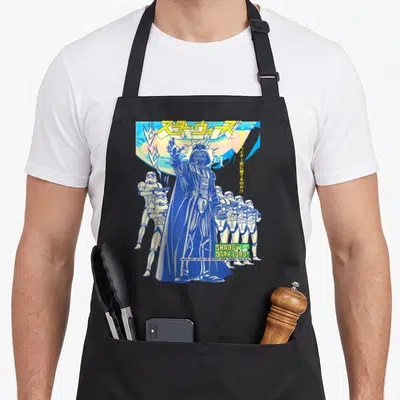 Tablier de cuisine noir avec une illustration de Darth Vader et Stormtroopers en style manga japonais aux couleurs bleues et vertes.