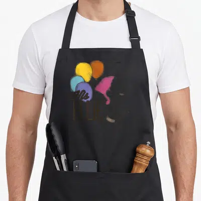 Tablier de cuisine noir avec illustration profil fille aux ballons et texte His Ellie en typographie stylisée.