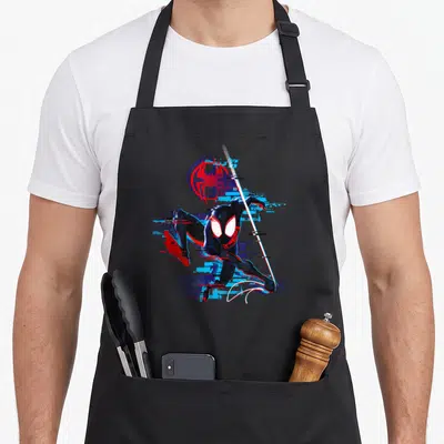 Tablier de cuisine noir avec illustration dynamique de Miles Glitch et effet numérique glitch.