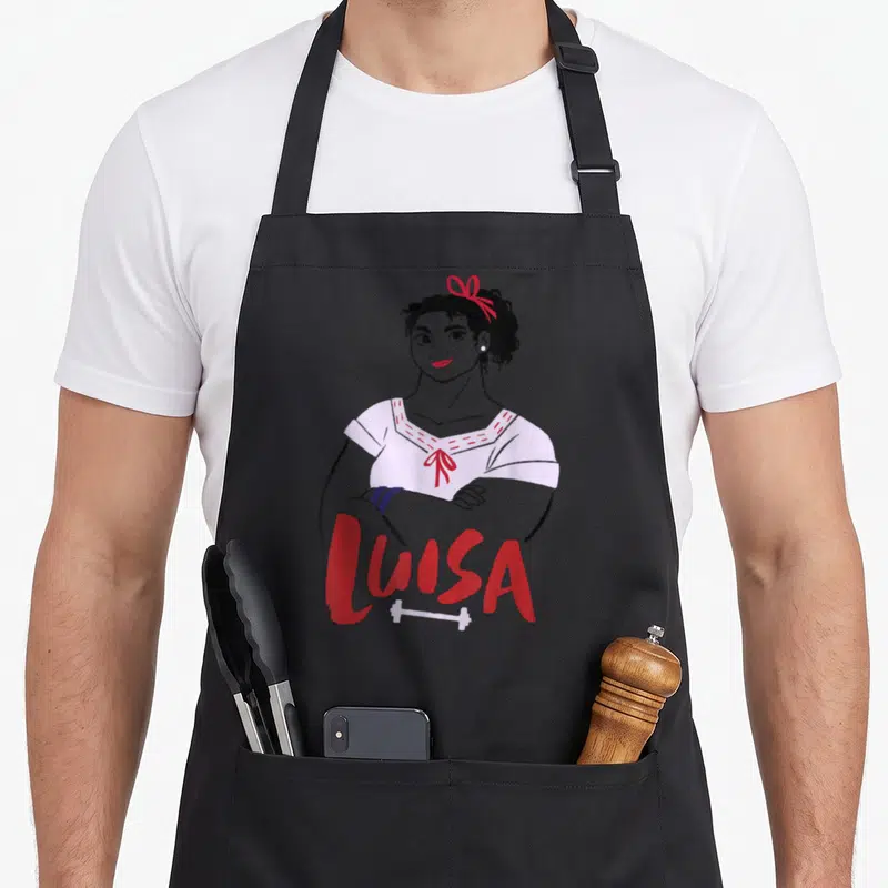 Tablier de cuisine noir avec illustration de Luisa en line art, nom en rouge et barre d'haltère blanche sous le texte.