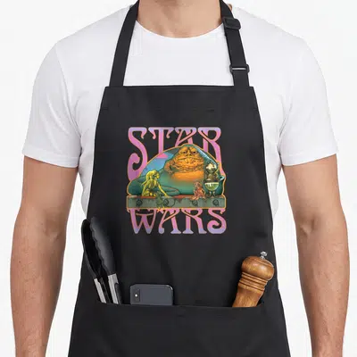 Tablier de cuisine noir avec illustration psychédélisée de Jabba le Hutt, Oola et C-3PO en style années soixante.