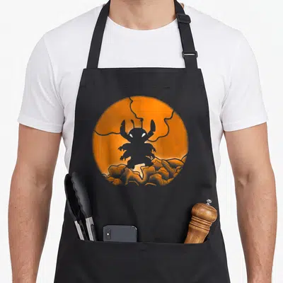 Tablier de cuisine noir avec silhouette Stitch sur fond circulaire orange et éclairs gris