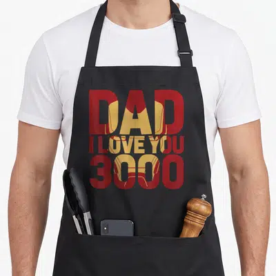 Tablier de cuisine noir avec texte Dad I Love You 3000 en rouge et or stylisé Iron Man.