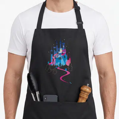 Tablier de cuisine noir avec illustration stylisée de Cendrillon et son château aux couleurs vives