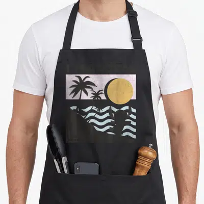 Tablier de cuisine noir avec illustration rétro de Stitch et palmiers sous le texte I'm a local