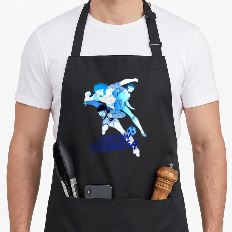Tablier de cuisine noir avec illustration de Captain Tsubasa et ballon de football en bleu