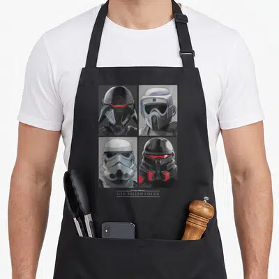 Tablier de cuisine noir avec quatre portraits de casques d'ennemis et le texte Jedi Fallen Order en bas.