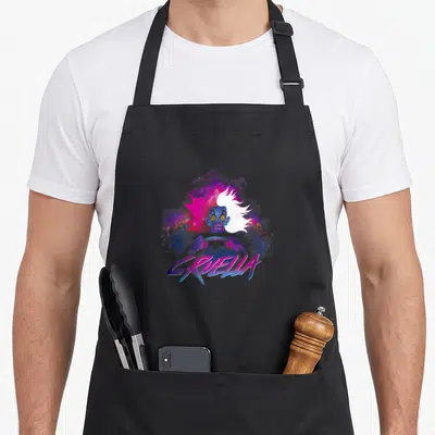 Tablier de cuisine noir avec illustration néon Cruella, visage bleu et cheveux blancs sur fond violet et rose.